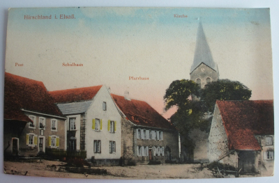 Alte PK AK Hirschland im Elsaß Post Schulhaus Pfarrhaus Kirche 1916 Feldpost WK
